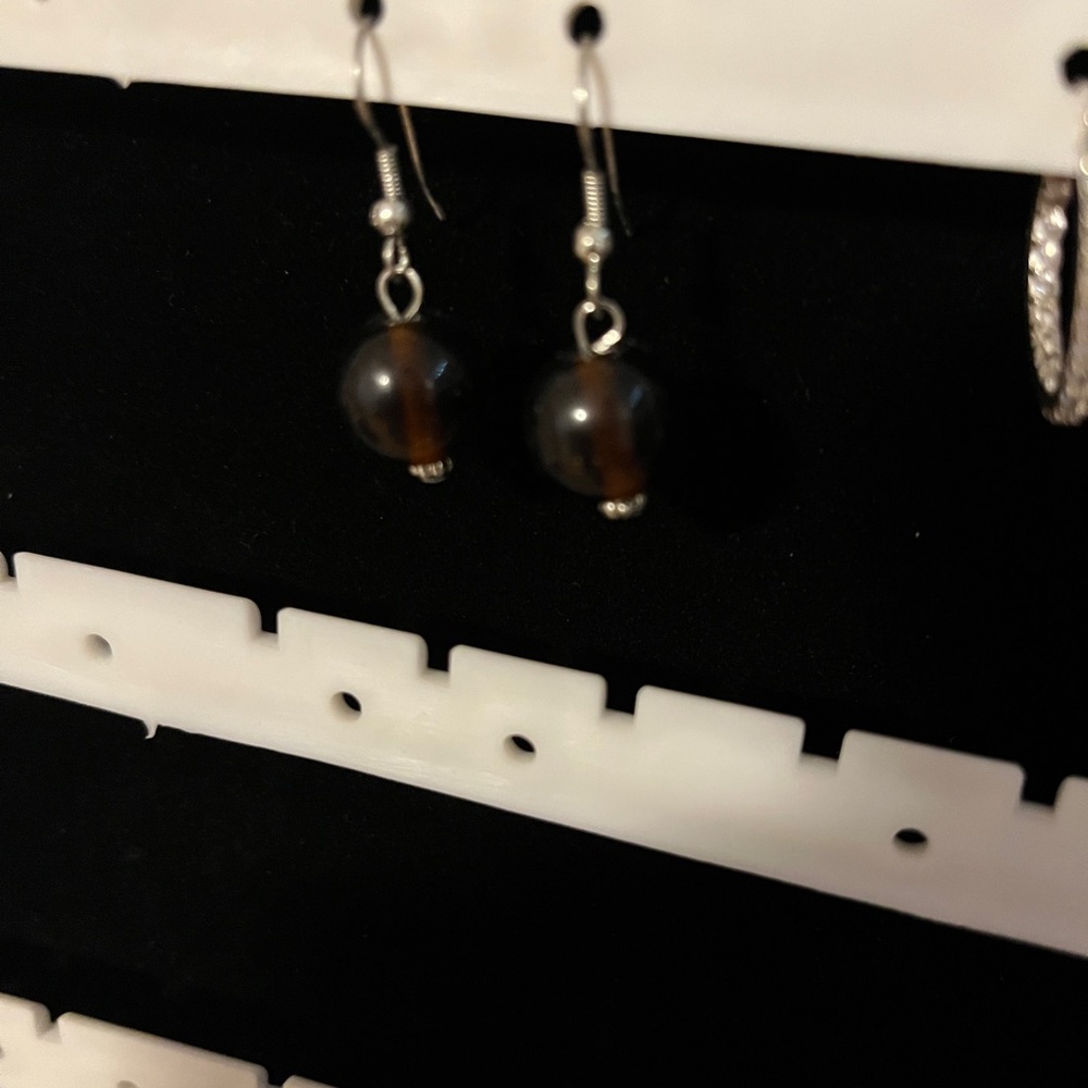 Brown round globe style beaded dangle earrings